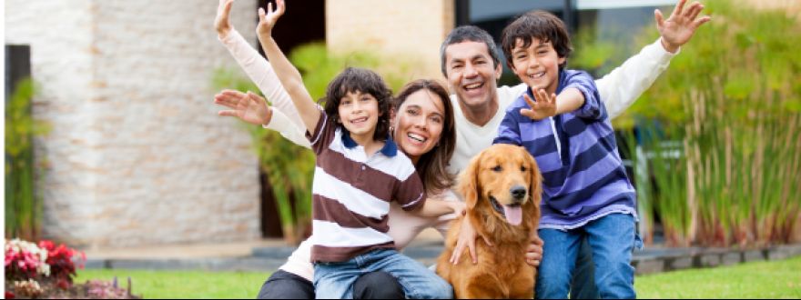 A diverse family in Miami, Florida, together in their backyard, symbolizing security and peace of mind through comprehensive insurance coverage