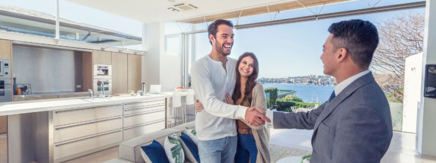 real estate agent with clients