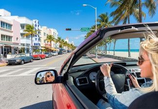Night view of Miami Downtown skyline courtesy of American US Insurance