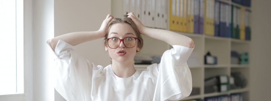 Woman looking startled and confused.