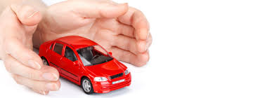 image of a red car sourounded by a pair of hands.  