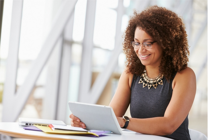 A lady at work in Dallas shopping for an insurance agent 