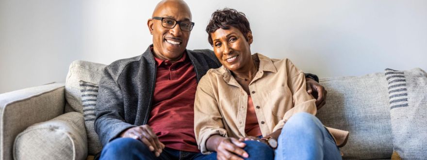 Happy couple over 50 exploring affordable life insurance options in Georgia.