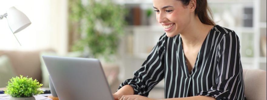 woman working on her laptop at home