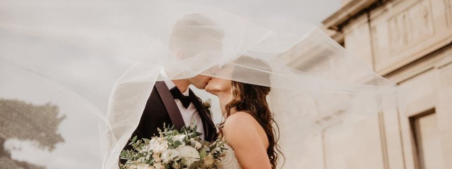 bride and groom kiss