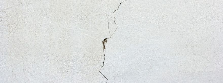 White wall with cracks, home insurance companies, medical expenses