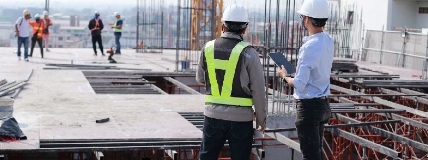 Construction workers on building site 