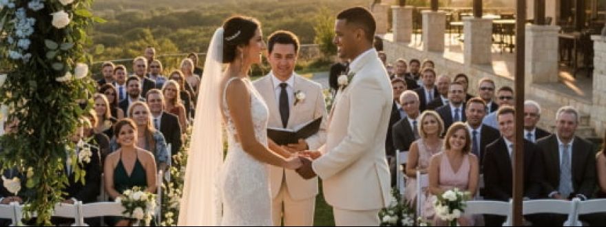 Outdoor Texas wedding with the couple exchanging vows under a floral arch, guests seated in chairs, showcasing a beautiful sunny day with no disruptions.