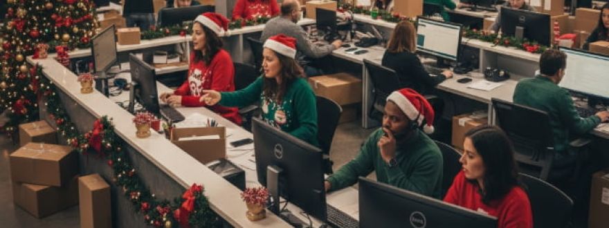 Texas business during the holiday season with employees working amidst increased cyber threats, showing the importance of cybersecurity protection.
