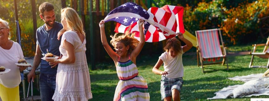 a family outside celebrating 4th july 