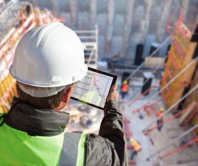 Workers inside a store with construction insurance in Dallas TX